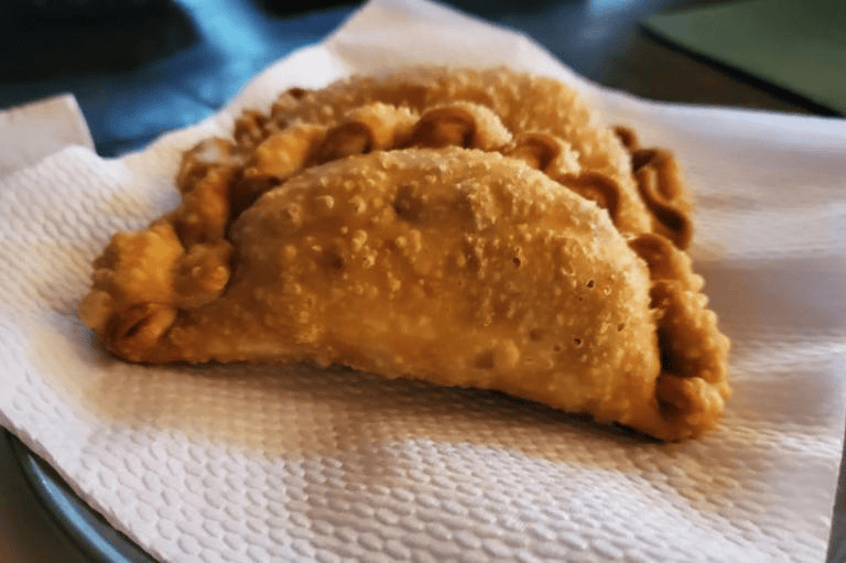 海地一女子毒杀约40名黑帮成员：在馅饼中掺入杀虫剂，自首称系为家人复仇